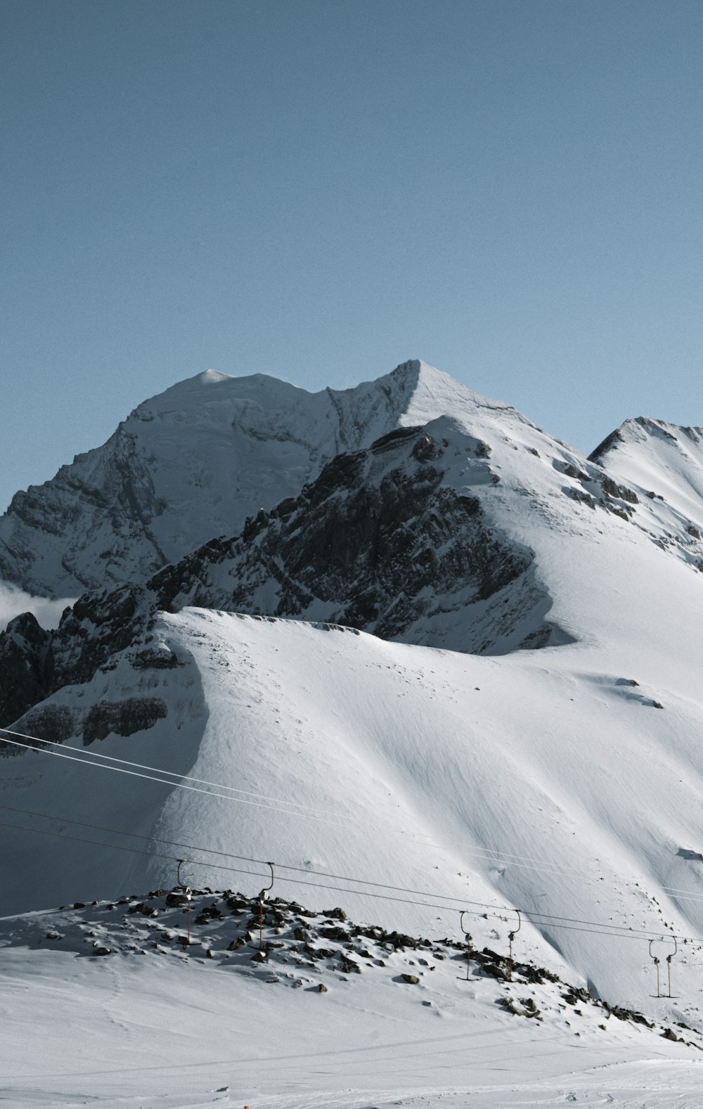 a person skiing down a snow covered mountain