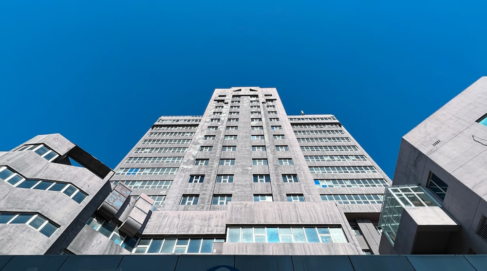 looking up at a tall building from below