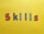 Colorful, patterned letters spelling out 'SKILLS' are arranged on a bright yellow background. Each letter features distinct patterns: red with white hearts, black with white stars, purple with yellow stars, and green with pink polka dots.