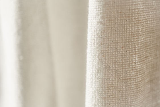 A close-up of a Skylark shirt fabric showcasing its texture and vibrant color under natural light.