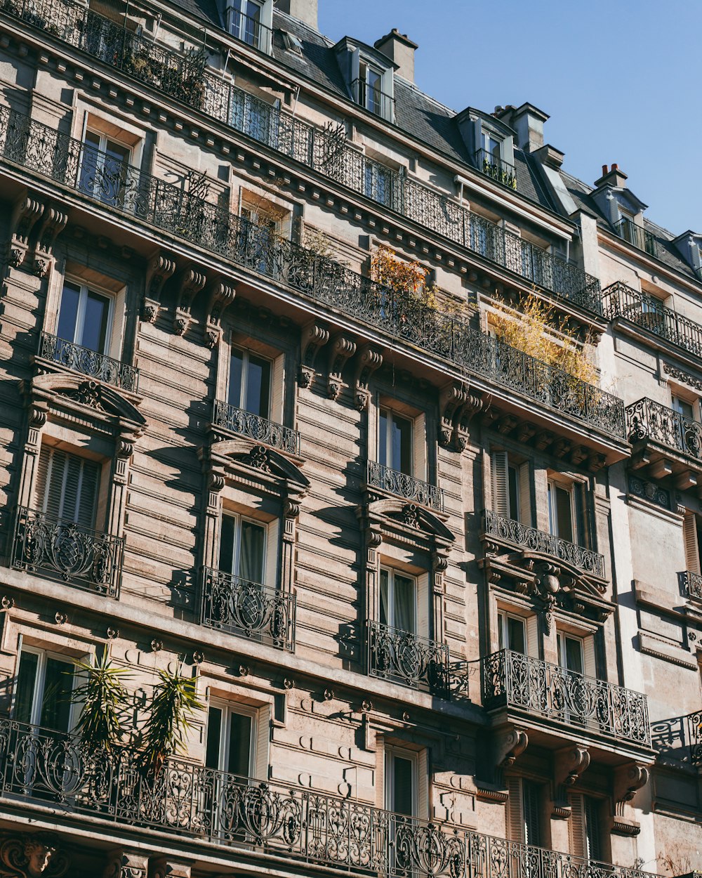 a tall building with balconies and balconies on the balconies