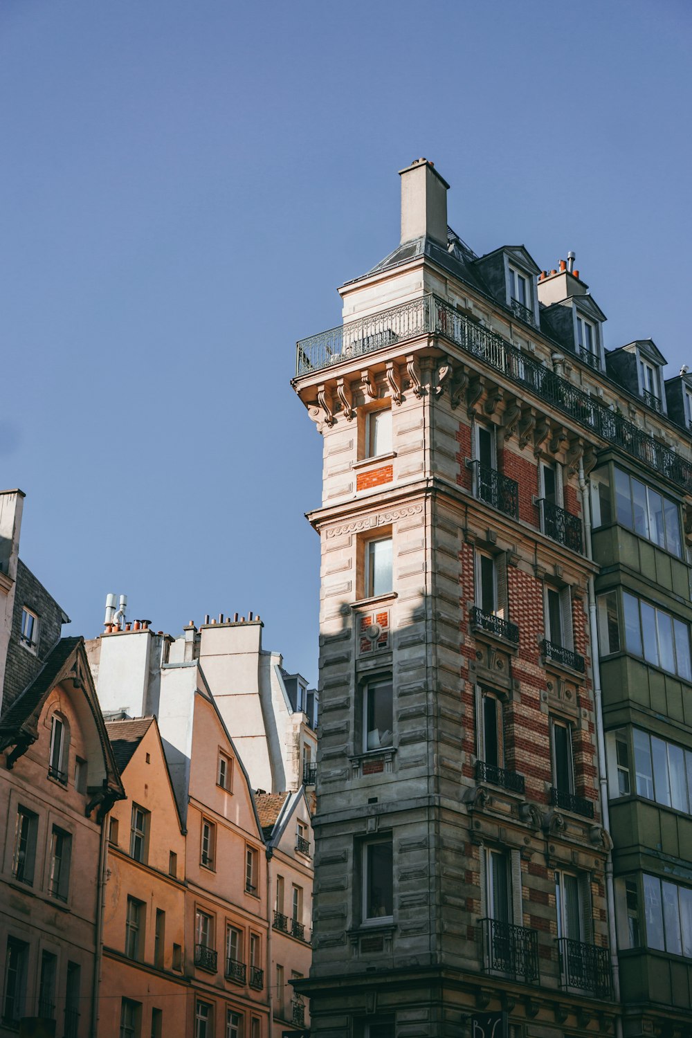 a tall building with a clock on the top of it