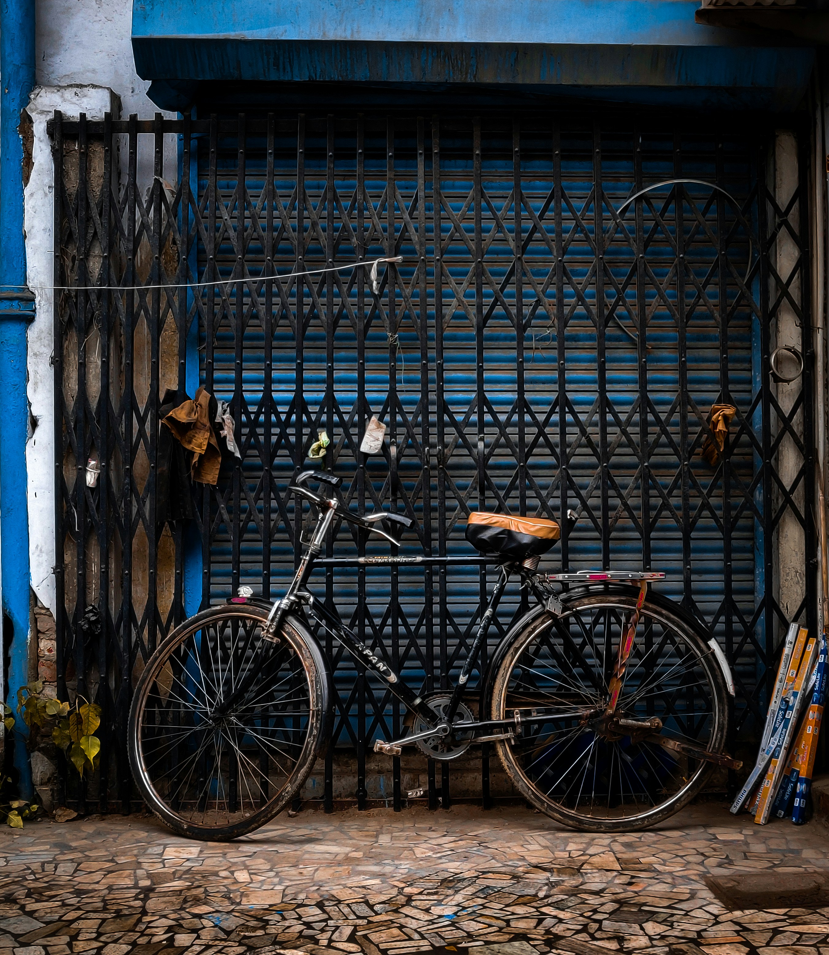 a bicycle parked in front of a building