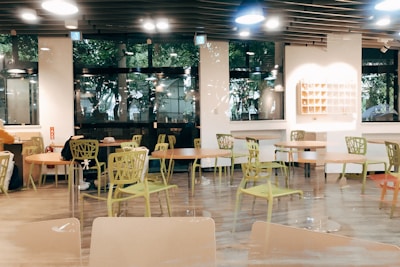 Stylish cafeteria renovation with warm lighting and comfortable seating areas.