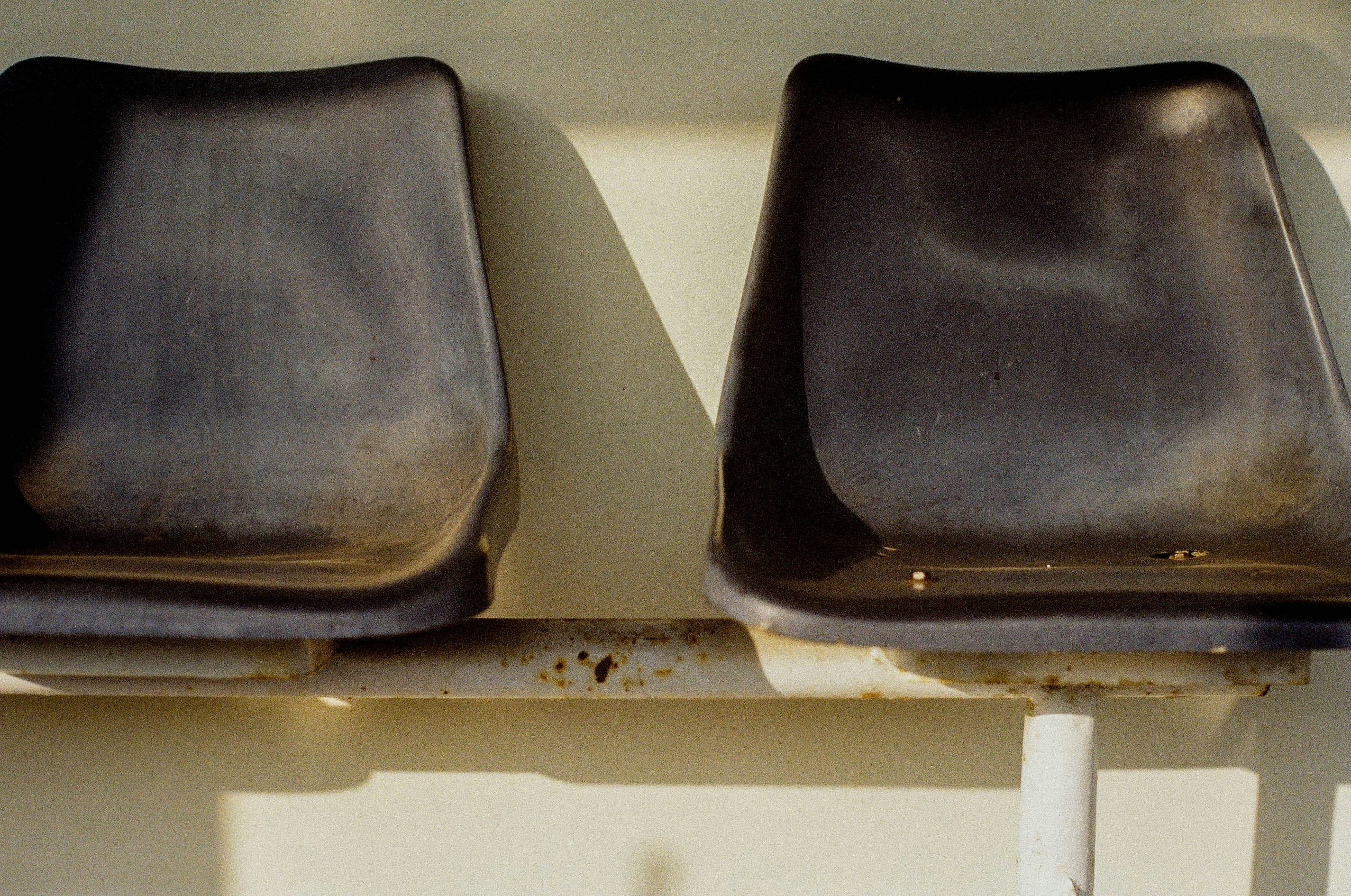 Interior of a three-row electric SUV with child seats installed in the back rows