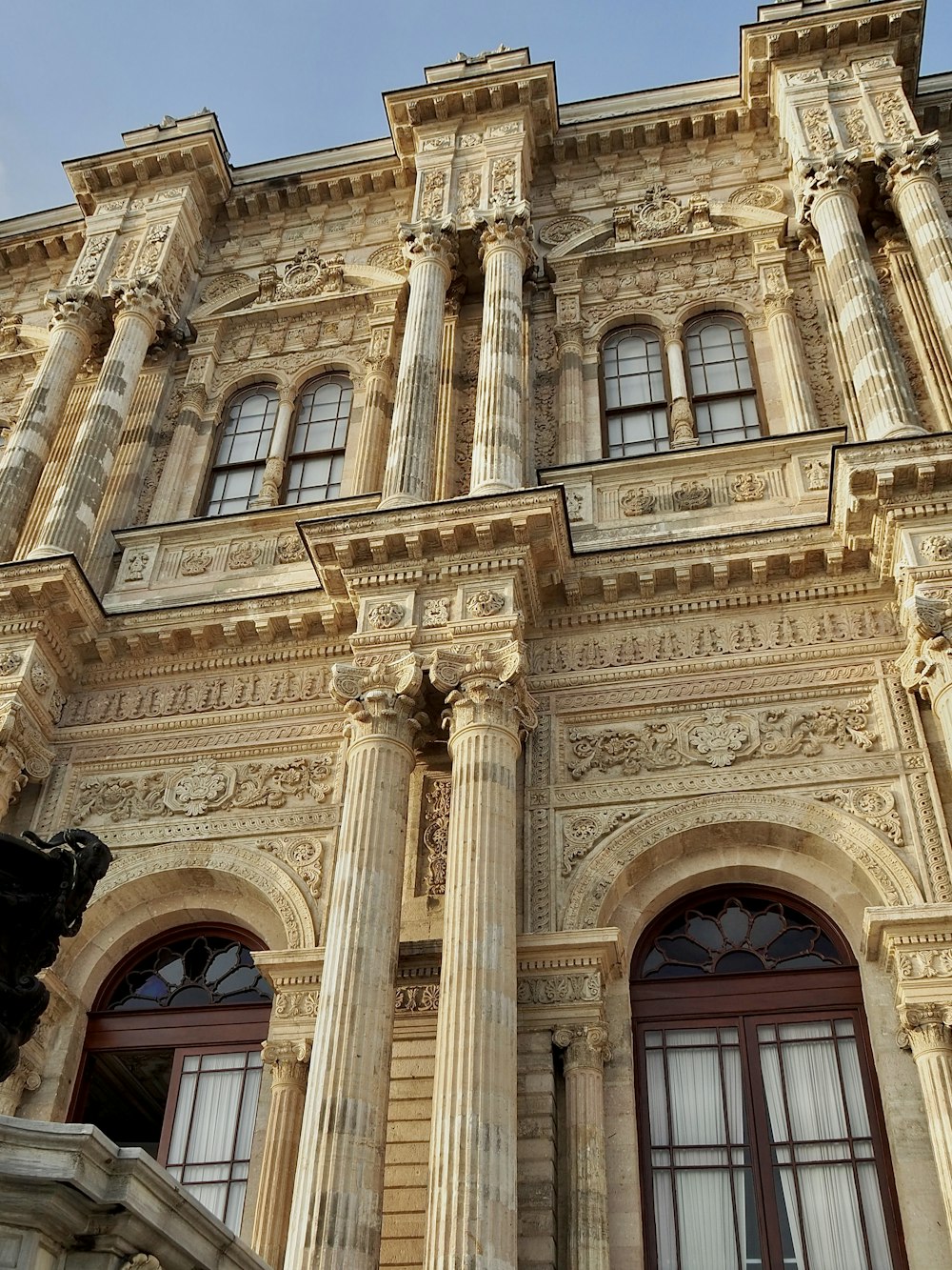 a tall building with a clock on the front of it