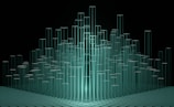 A digital abstract representation featuring multiple transparent green bars arranged in a clustered formation against a dark background. The bars appear to be illuminated, with a wireframe grid at the base.