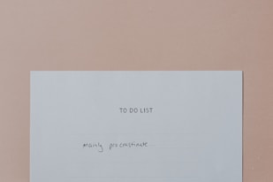 a piece of paper with a note attached to it