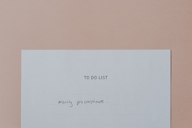 a piece of paper with a note attached to it
