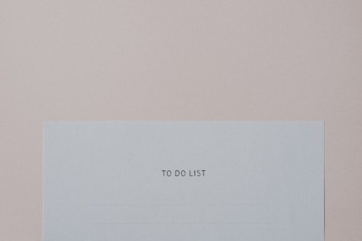 a piece of paper with the words to do list on it
