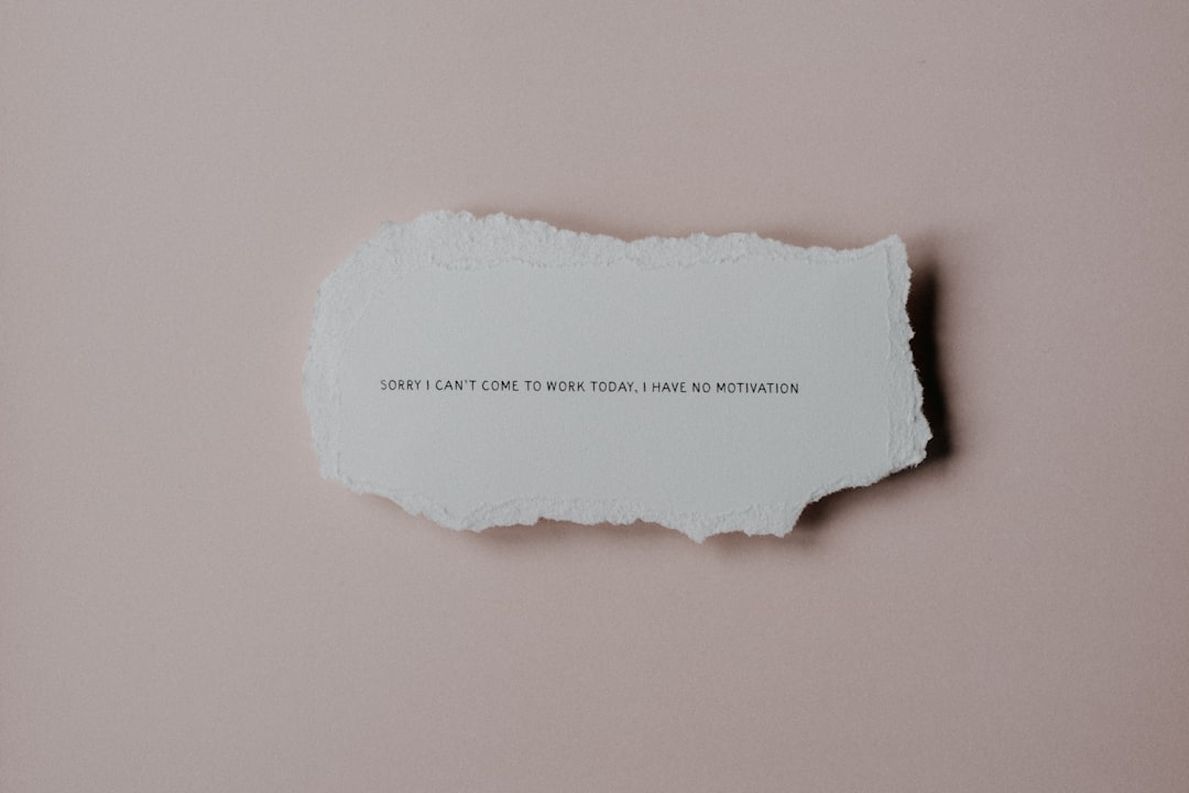 a piece of torn paper with a quote on it