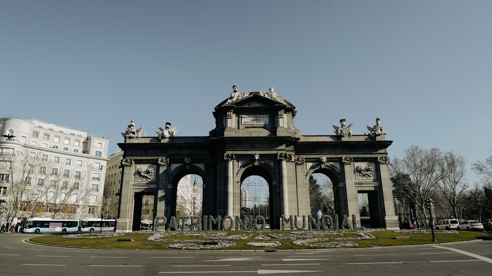 a large building with statues on top of it