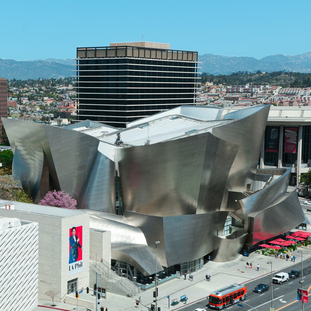 a large building with a giant metal structure on top of it