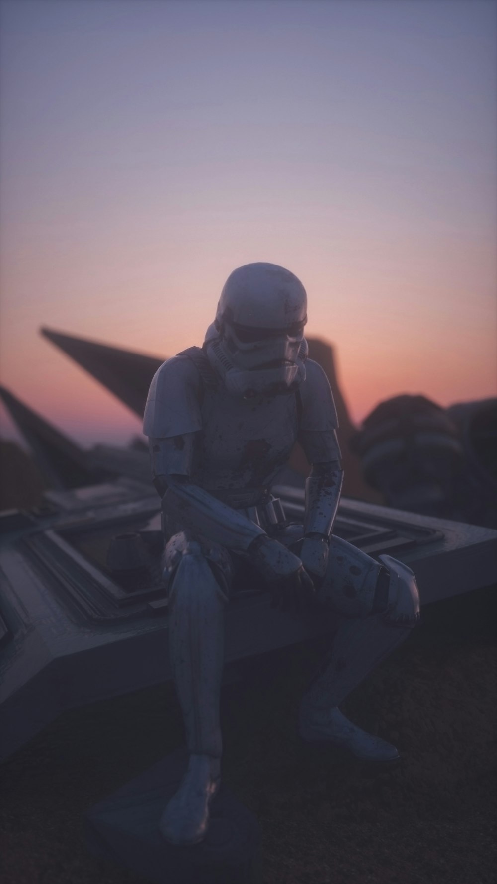 a man in a star wars costume sitting on a bench