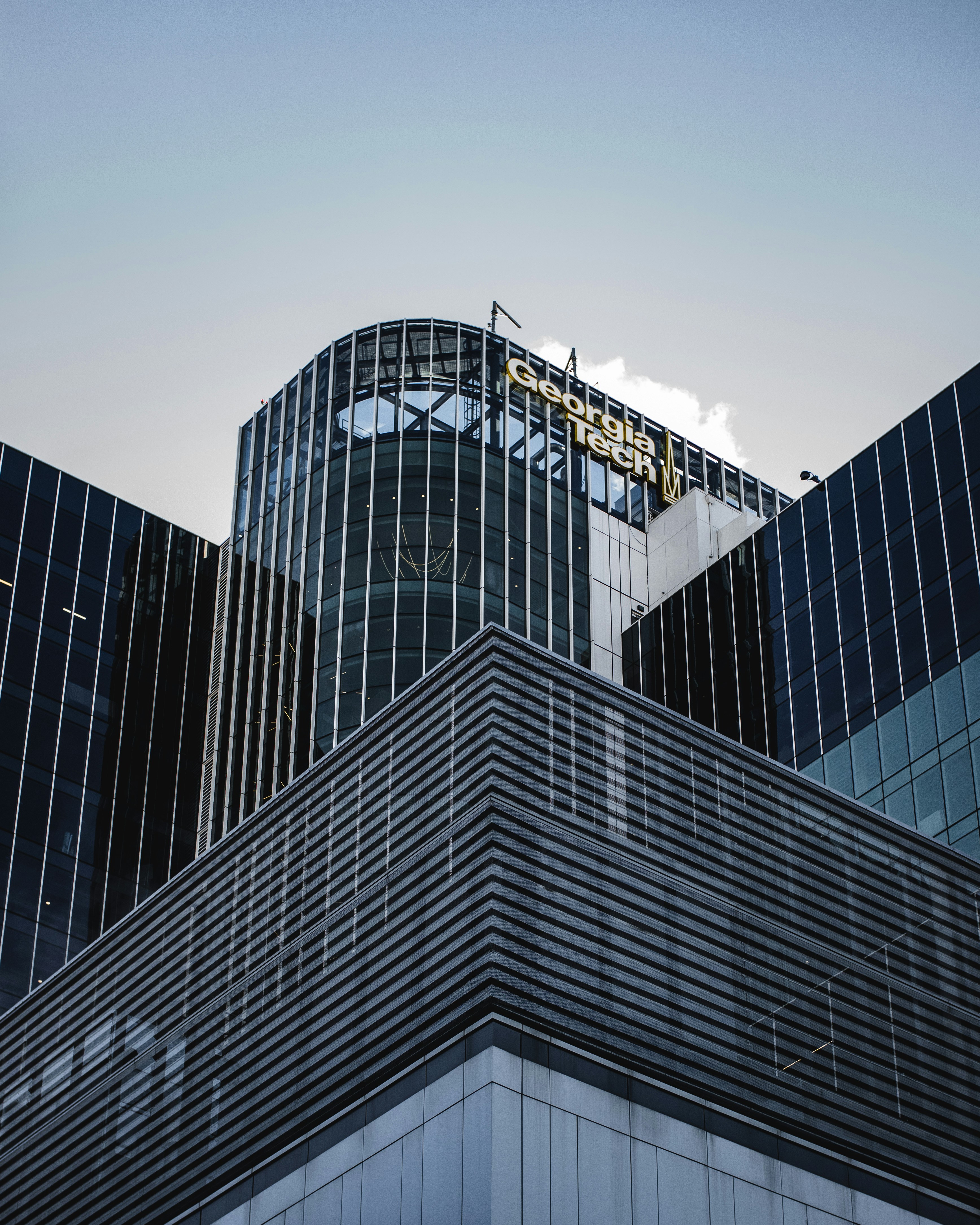 a very tall building with a clock on it's side