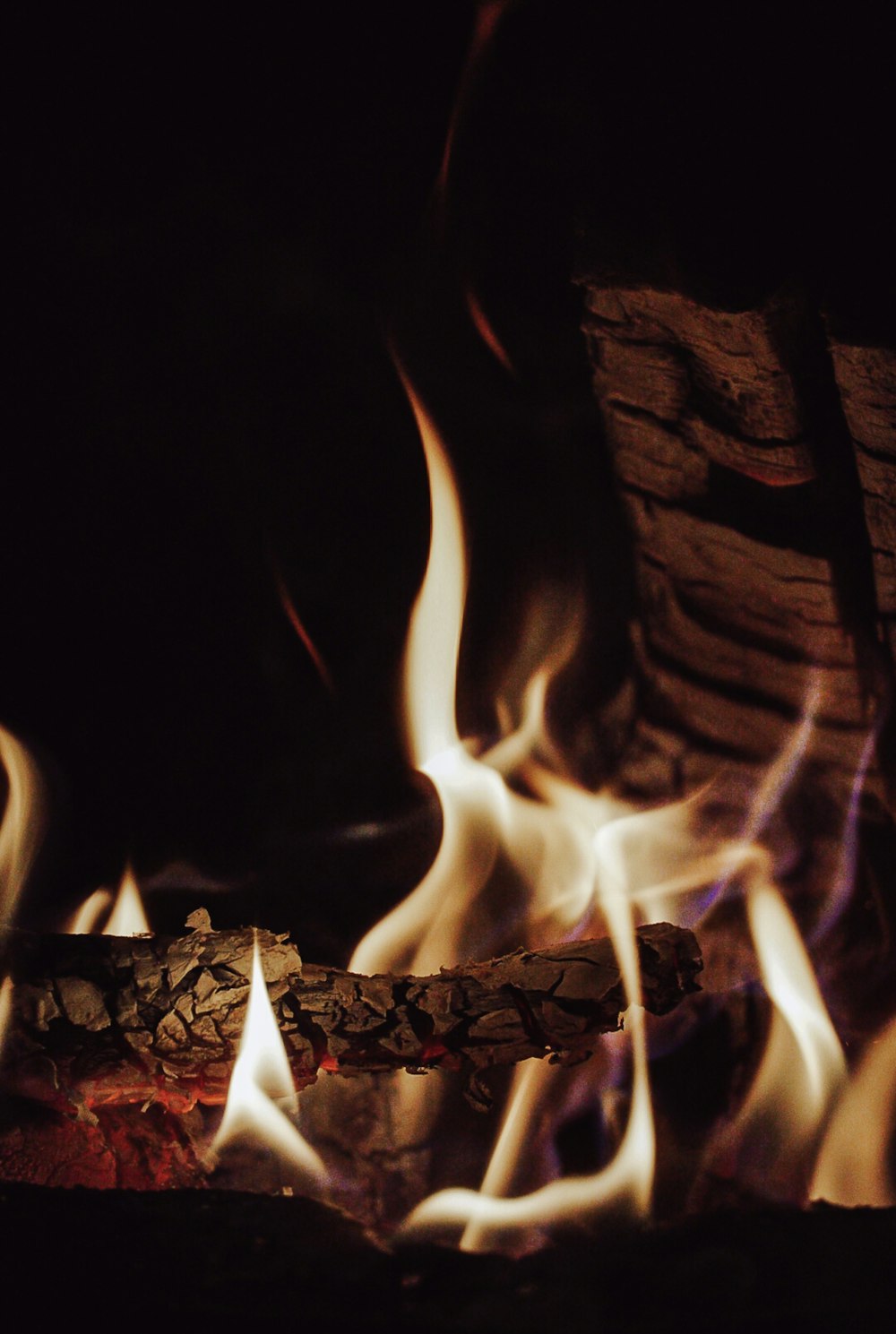 a close up of a fire in a fireplace