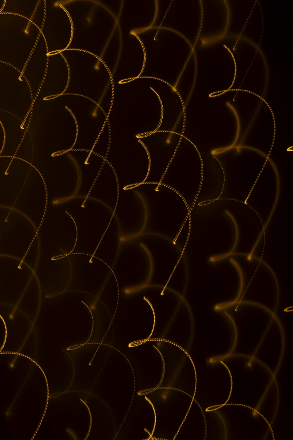 A black background with a bunch of yellow circles photo – Free Wallpapers  Image on Unsplash