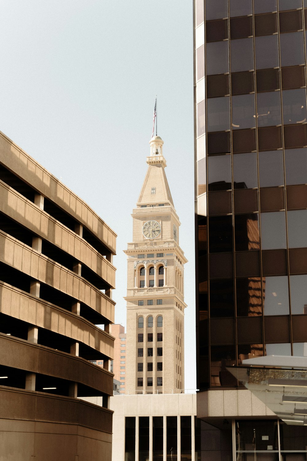 a tall clock tower towering over a city