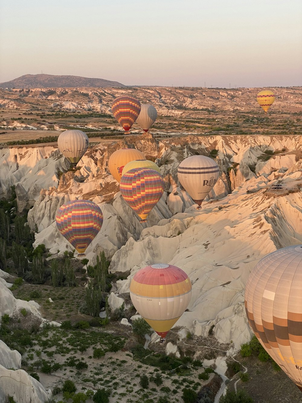 a bunch of hot air balloons in the sky