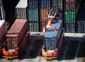 cargo containers are stacked on top of each other