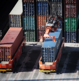 cargo containers are stacked on top of each other