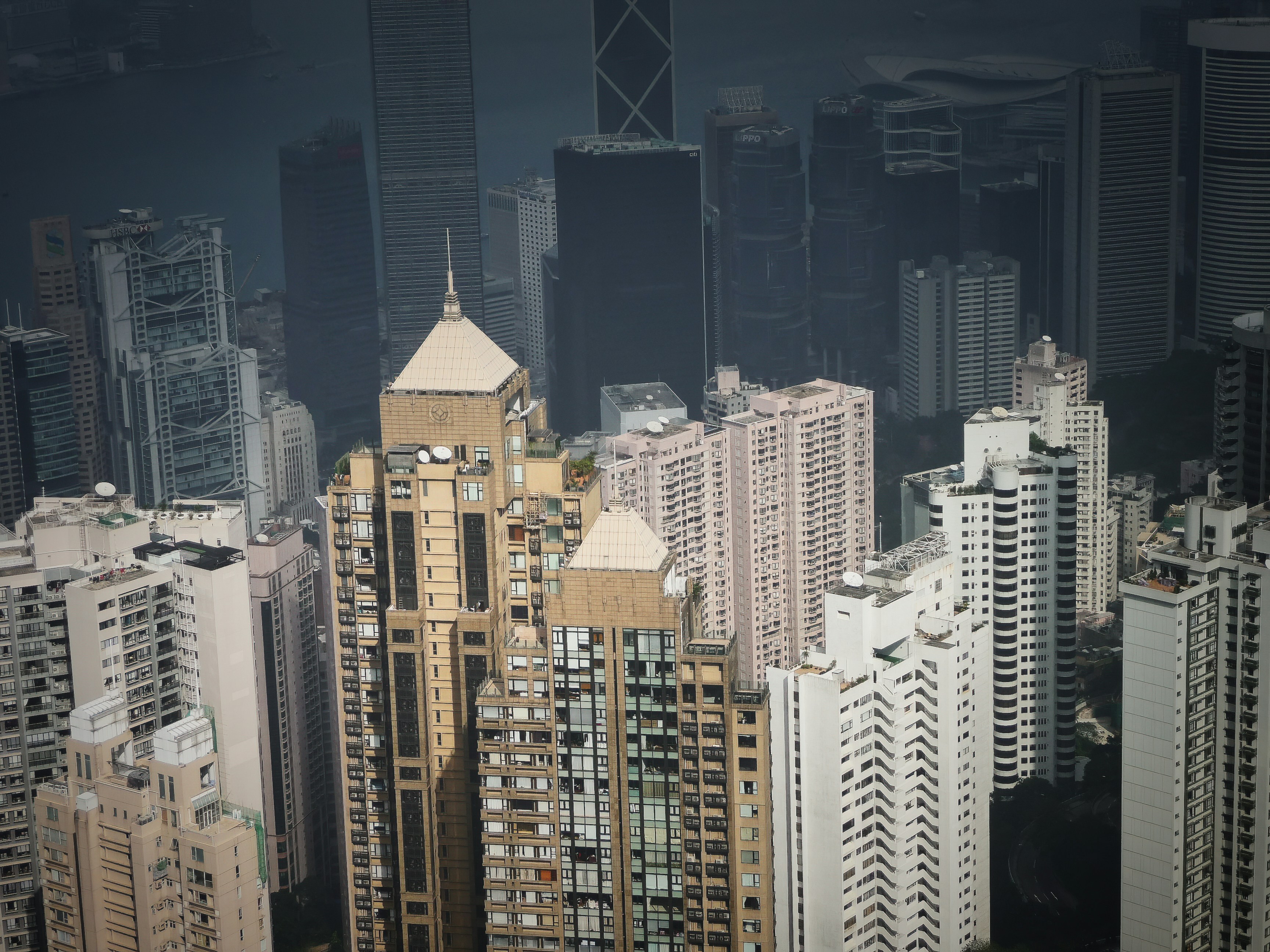 a view of a large city with tall buildings