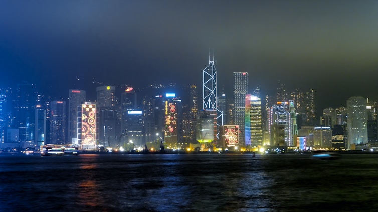 A softly lit, elegant Kolkata cityscape at night, hinting at the vibrant nightlife.