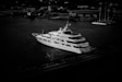 a large white boat floating on top of a body of water