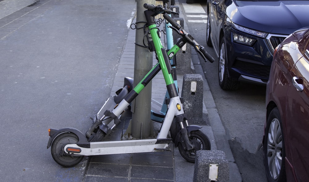 a scooter is parked on the side of the street