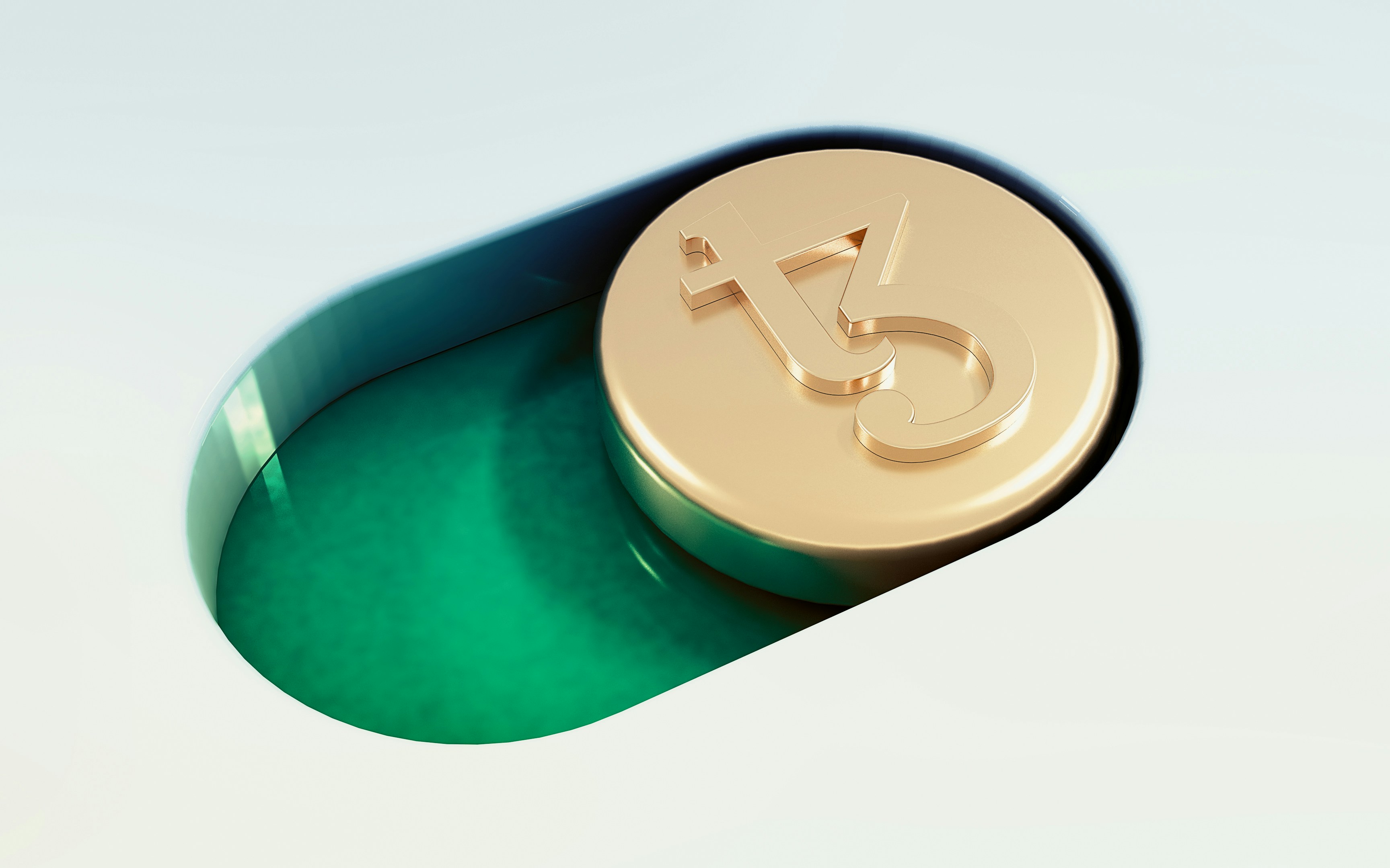 Close-up shot of a Tezos Cryptocurrency coin, stylized as a toggle notification button.