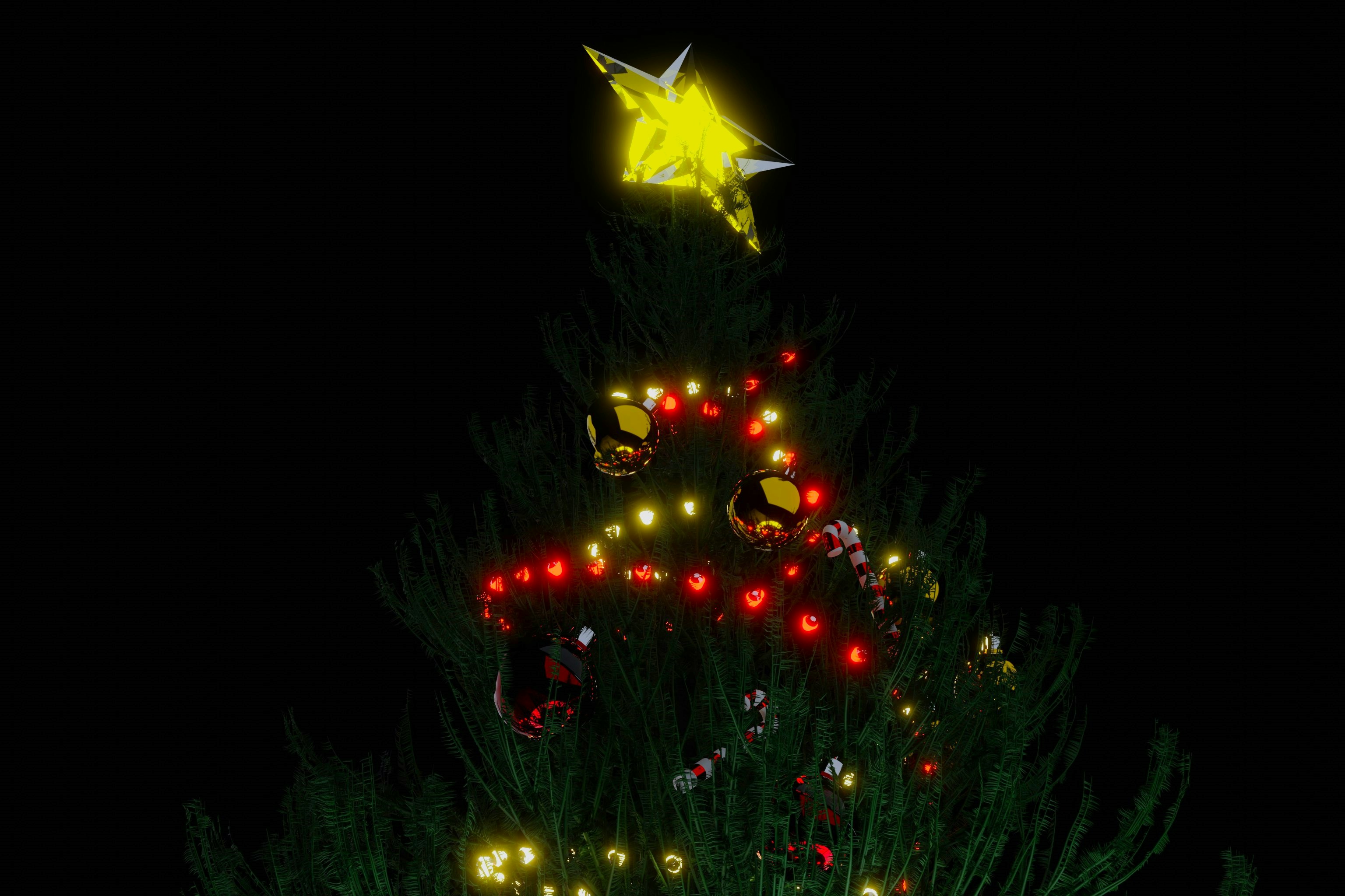 Un árbol de Navidad iluminado con una estrella en la parte superior