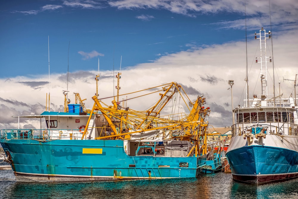 a couple of boats that are sitting in the water