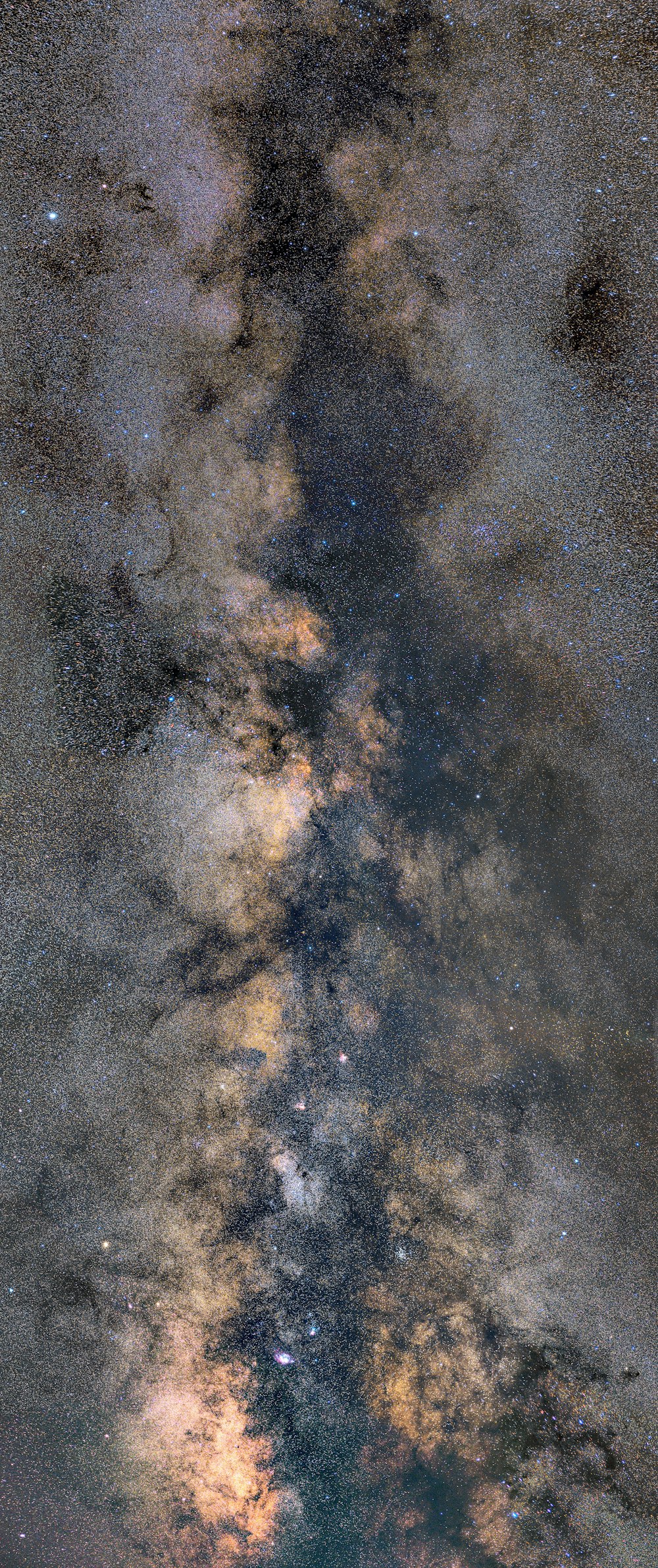 a reflection of the sky in a puddle of water