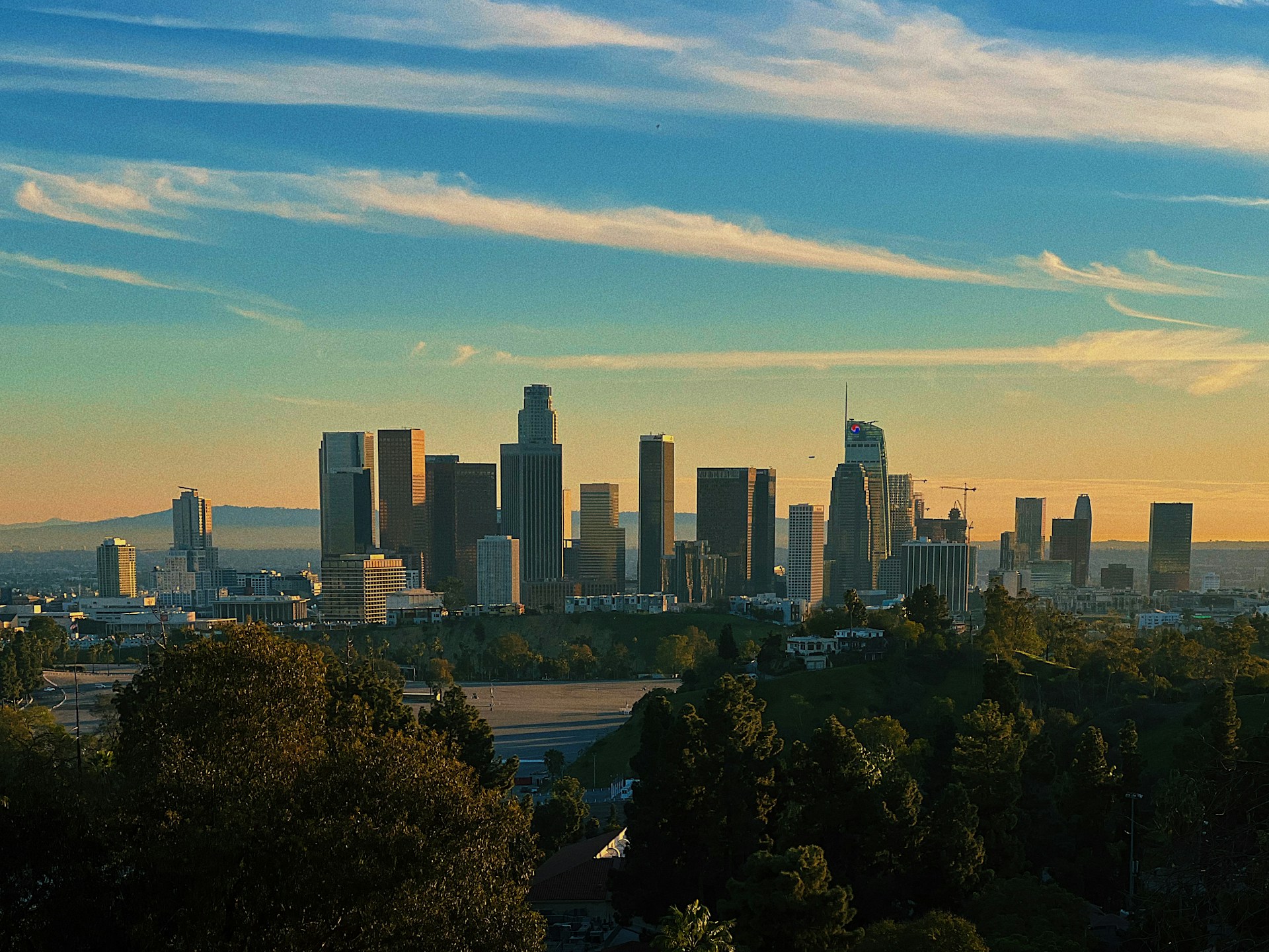 a view of a city from a hill
