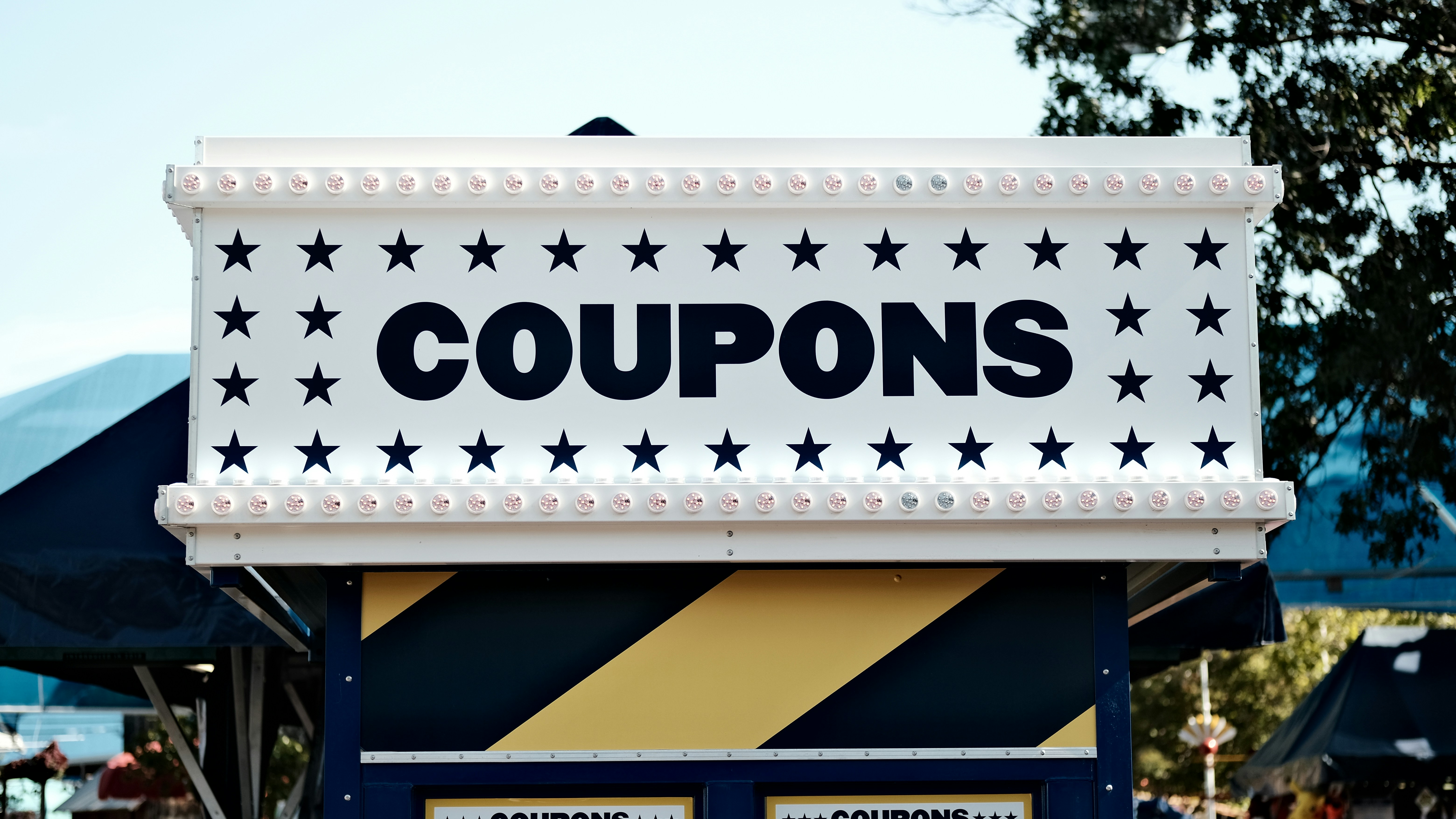 a sign that says coupons on it