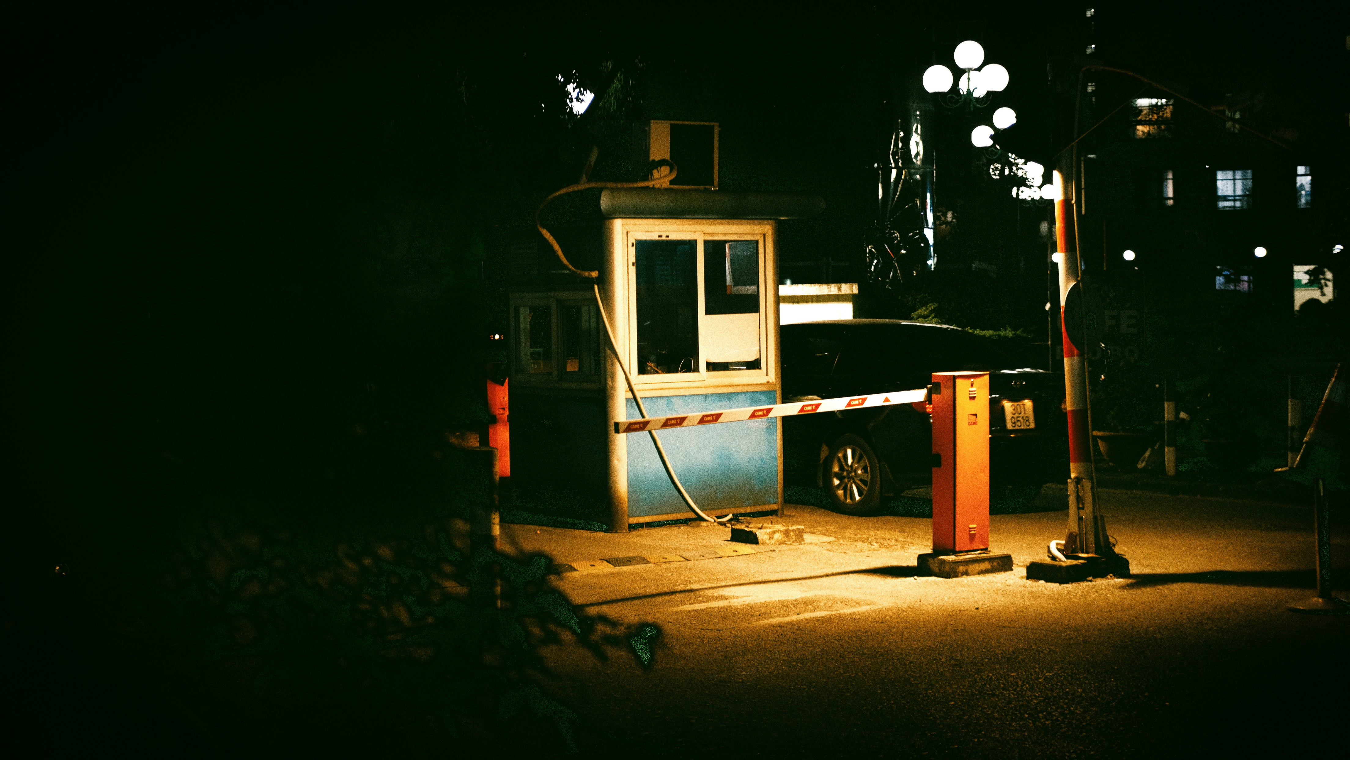 Electric SUV plugged into a DC fast charging station at night