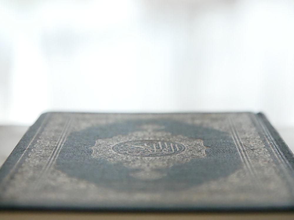 a close up of a book on a table