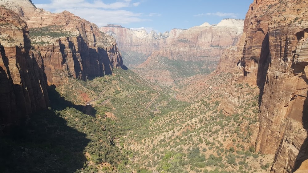 a scenic view of a canyon in the mountains