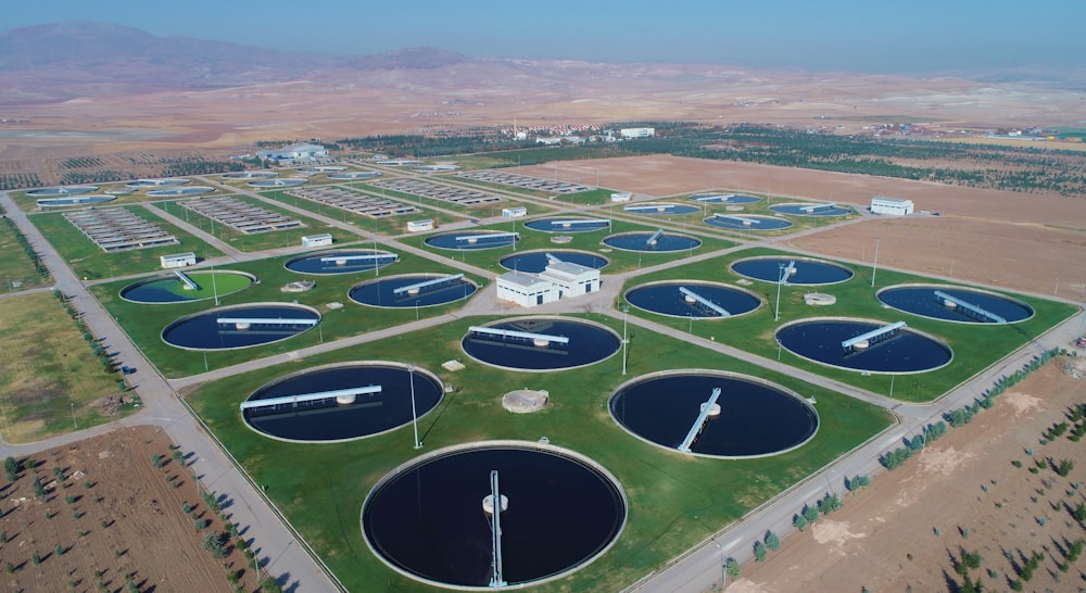 an aerial view of a large field of water tanks