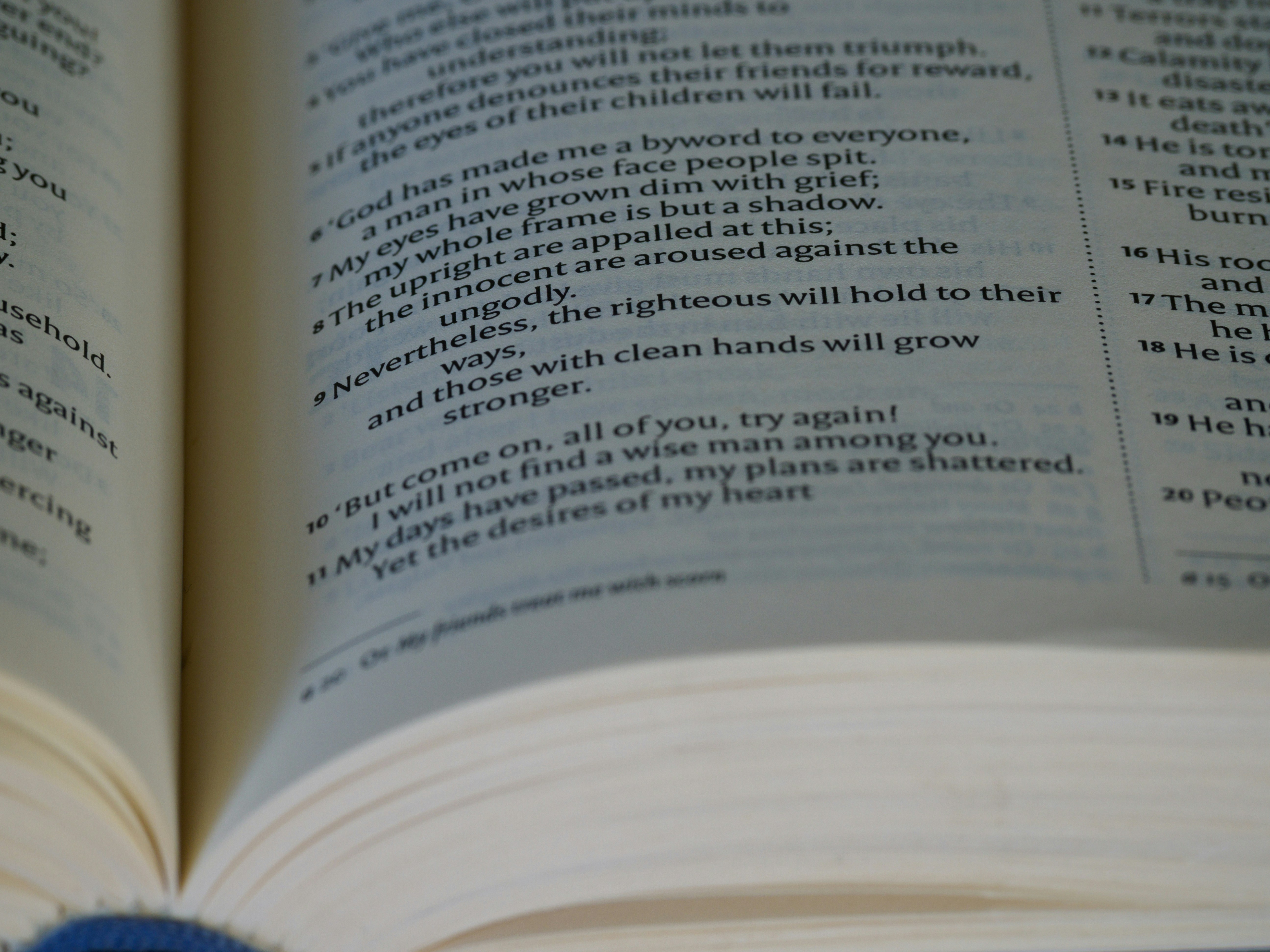 a close up of an open book on a table