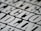 A close-up view of bold, black and white text with a slightly blurred effect, giving the impression of a print or poster design. The letters are large and occupy much of the frame, creating a striking visual impact.