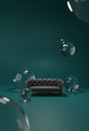 a couch sitting on top of a green floor