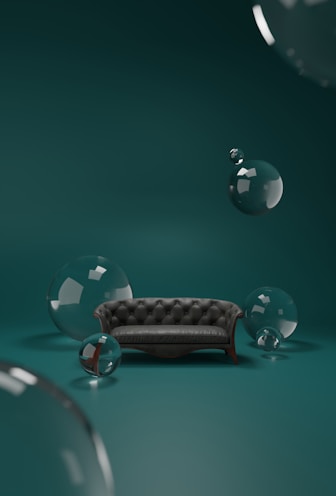 a couch sitting on top of a green floor