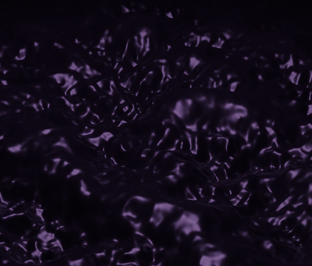 a dark purple background with a lot of bubbles