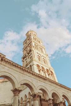 a tall clock tower towering over a city