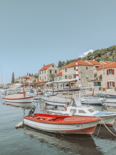 a group of boats that are sitting in the water