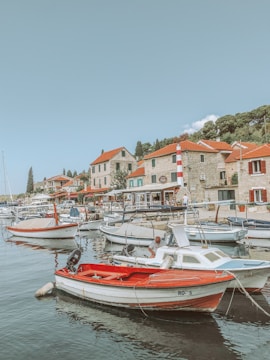 a group of boats that are sitting in the water