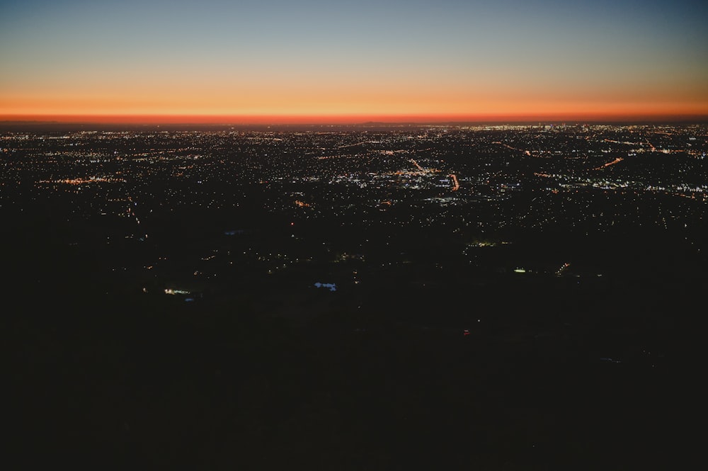 an aerial view of a city at night