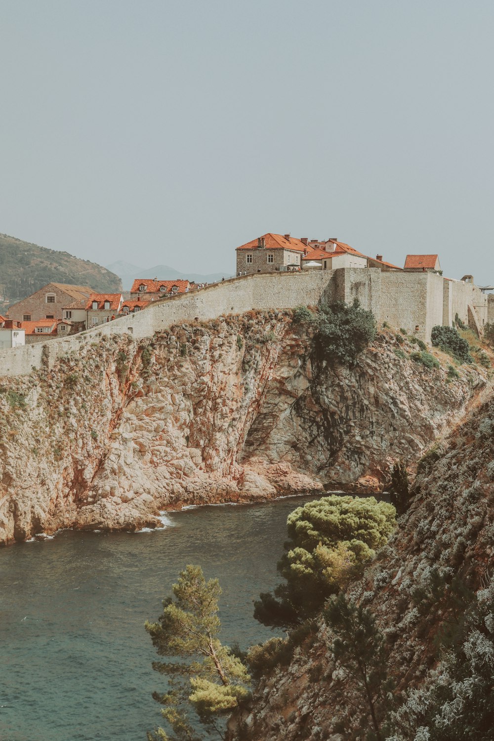 a building with a large rock