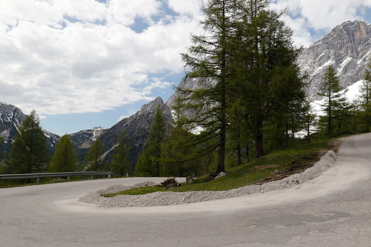Mountain road winding through scenic landscape